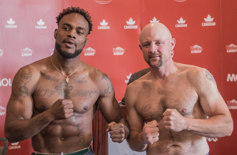 Brad Wilson, right, with his opponent Markhaile Wedderburn, who fought on   June 24.  Wedderburn won the fight after it was stopped in the second round. submitted