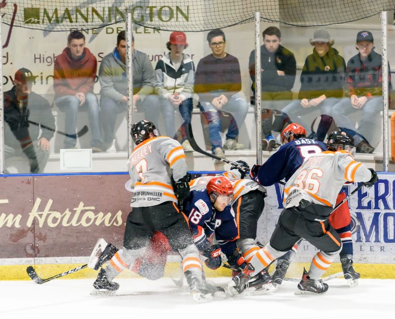 The Dragons and Bandits game did not end without many scrapping fights. Mailphoto by Terri Huxley