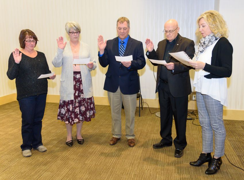 Joanne Hodgson, Joanne Contenti, Brock Harrington, Barry Fullerton are sworn in as Directors for the DDCC by Drumheller Mayor Heather Colberg on Thursday, March 22, at the Badlands Community Facility. mailphoto by Terri Huxley