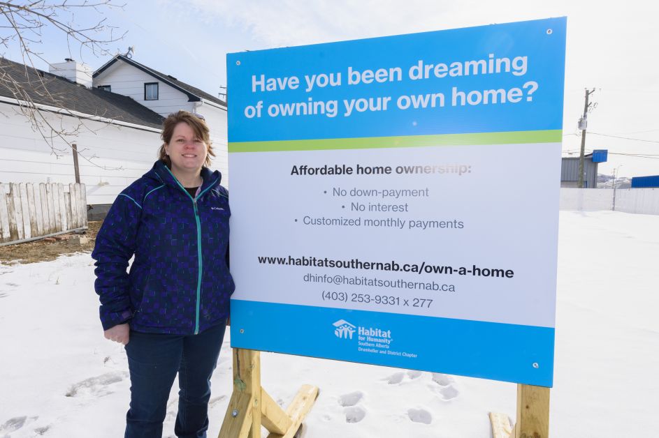 Sheri Cooper stands at the location of the upcoming Habitat for Humanity Project in North Drumheller on Friday, April 6. The organization is looking for successful applicants to make the duplex project a reality for 2018.  mailphoto by Terri Huxley